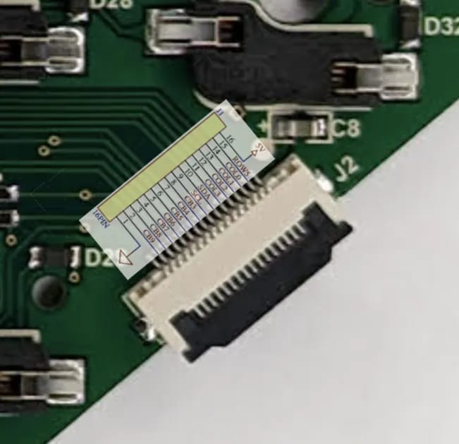 An image overlaying the pinout diagram over a picture of the ribbon cable connector on the keyboard PCB.