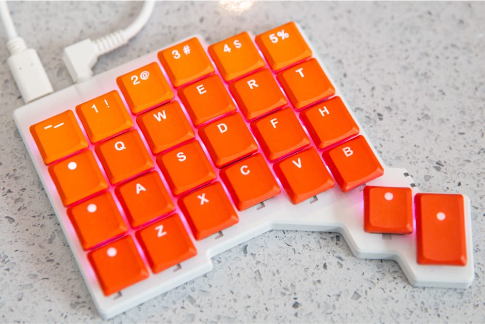 A set of orange keycaps